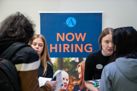 people in front of a sign