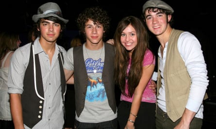 Jonas Brothers with Miley Cyrus, 2007.