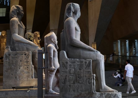 People look at the huge exhibits on display