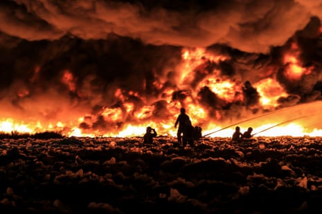Firefighters tackle a blaze at a Birmingham plastics recycling plant in 2013. 