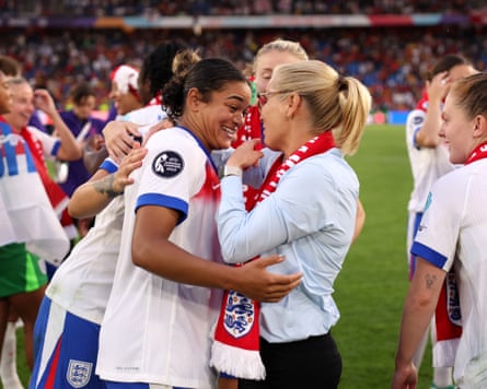 England’s Jess Carter is embraced by Sarina Wiegman after winning the Women’s Euro 2025.