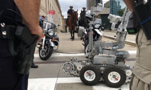 Police officers in Cleveland, Ohio, demonstrate some of their security assets, including remote-controlled robots, horse-mounted officers, bomb-sniffing dogs ahead of the Republican national convention.