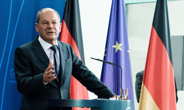 Olaf Scholz interrupted his holiday for the news conference.