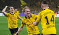 Niclas Füllkrug celebrates with teammates after scoring Borussia Dortmund’s winning goal against PSG