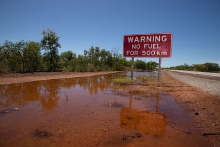Fuel warning sign on the roadside in the Northern Territory