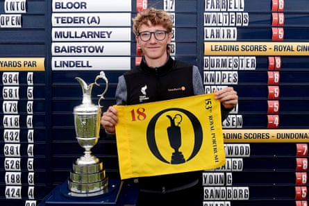 Richard Teder poses with a flag after qualifying for the Open