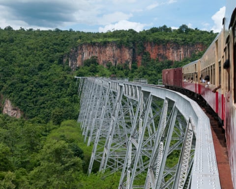 A train travels along the Gokteik Bridge from Maymyo to Lashio in Myanmar. The bridge has been destroyed in recent fighting.