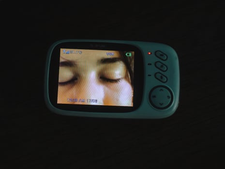 Poppy Noor with her eyes closed on a baby monitor