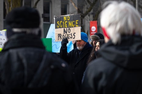 a person holding a sign