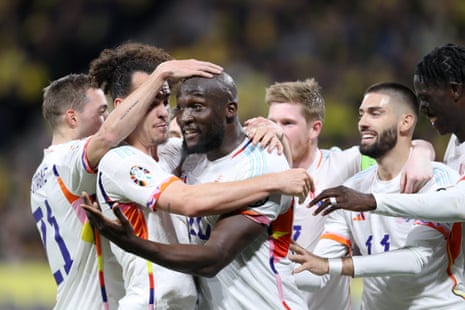 Romelu Lukaku of Belgium celebrates with teammates after scoring the team's first goal.