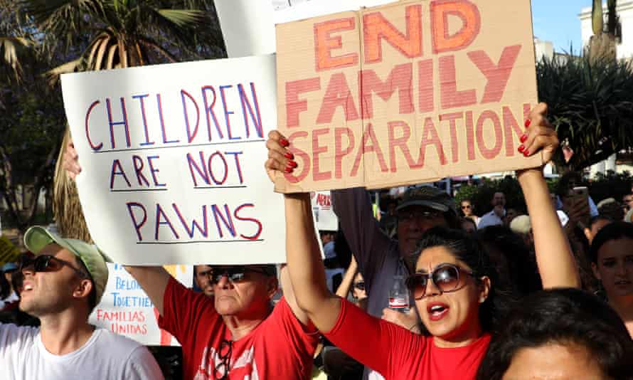 Protesters denounce the Trump administration’s policy of separating detained immigrant children from their parents, at a rally and march in Los Angeles, California, 14 June 2018.