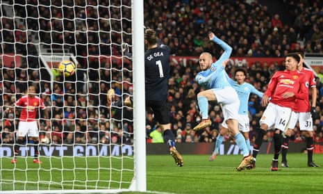 David Silva hooks home Manchester City’s first goal past David De Gea at Old Trafford on Sunday evening.