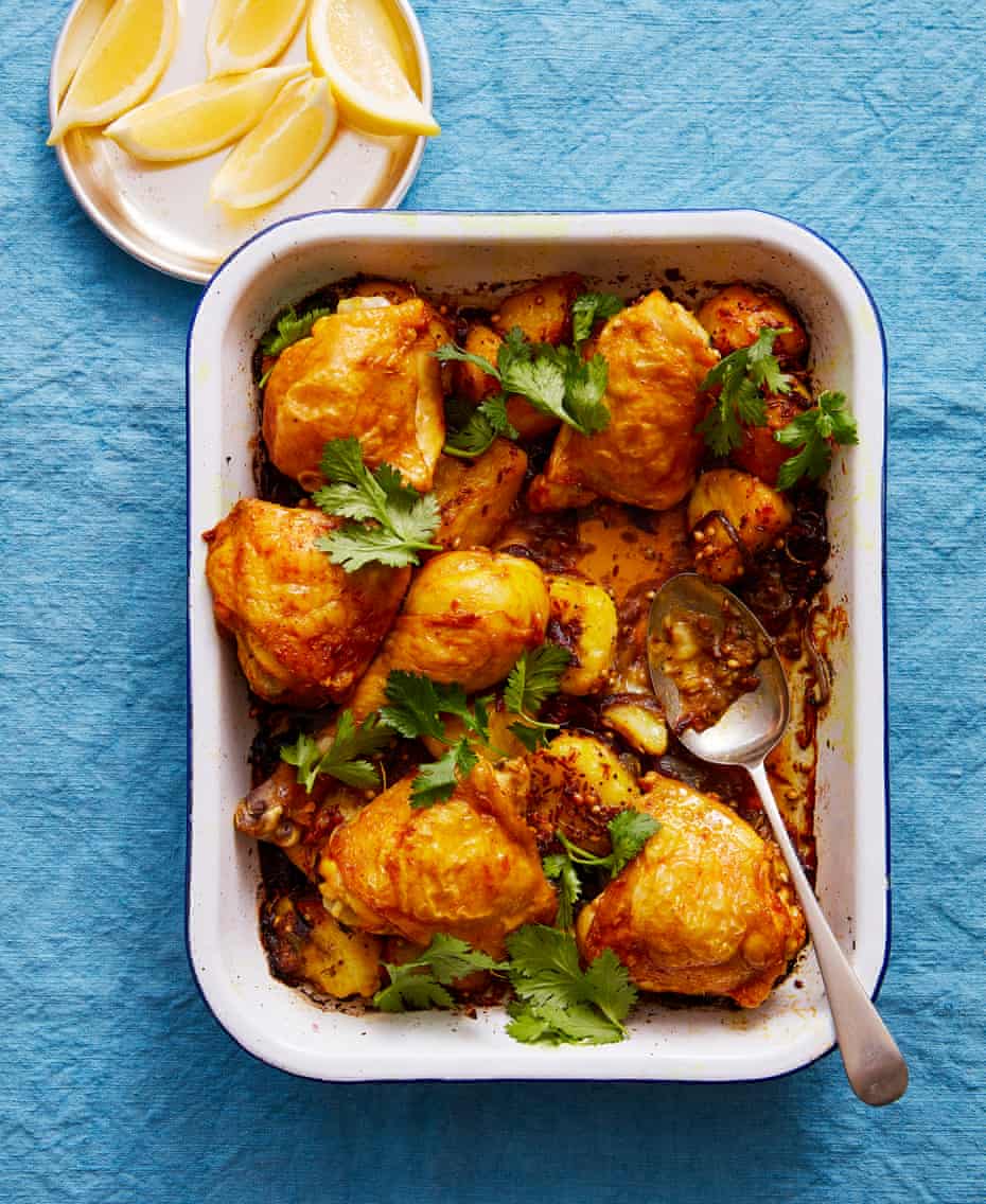 Thomasina Miers' spiced turmeric chicken bake with smashed golden potatoes & mustard seeds