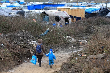 A migrant and her child in the southern part of the camp of migrants in Calais, in February 2016