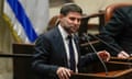 Bezalel Smotrich speaks into a microphone in the Knesset