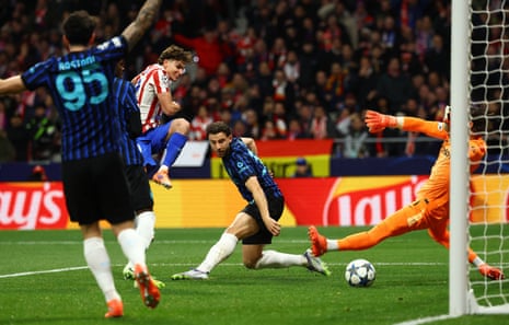 Atletico Madrid's Julian Alvarez fires home from close range to open the scoring.