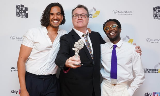 Nathaniel Curtis, Russell T Davis and Omari Douglas with the award for Its A Sin, which won the TV Drama Award, at the South Bank Sky Arts Awards at the Savoy in London.