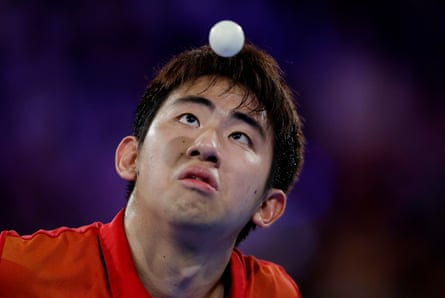 Yew En Koen Pang of Singapore eyes the ball during the men’s team table tennis final.