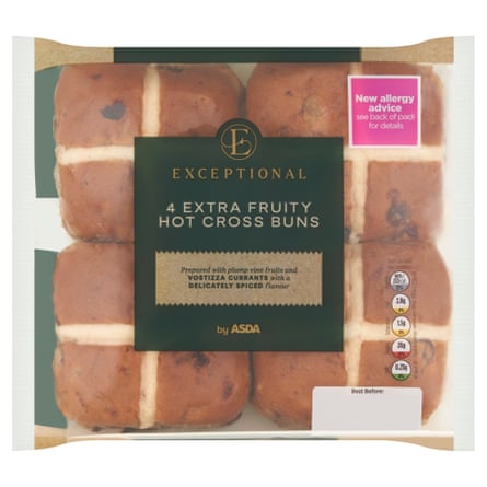 Four Asda Extra Fruity Hot Cross Buns in a packet