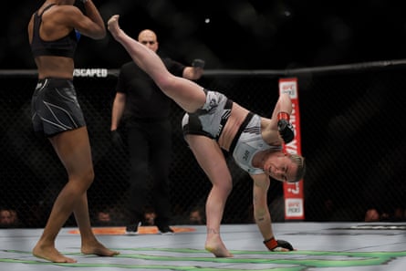 Molly McCann aims a kick at Luana Carolina during their UFC bout at the O2 Arena in March 2022
