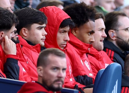 Manchester United’s Lisandro Martínez on the bench after he was taken off at half-time