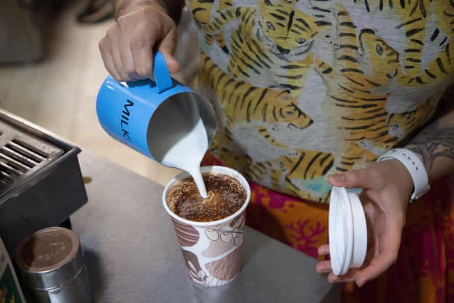 Waan Bransgrove pouring a drink at the Kickknack Cafe