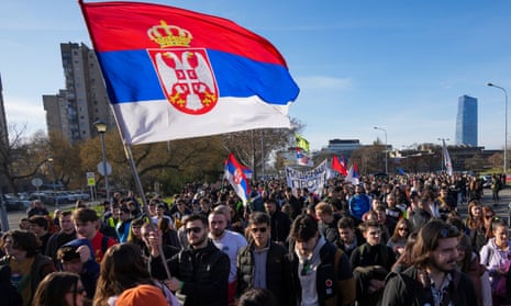 Students walk towards the northern city of Novi Sad, where they will participate in a 24 hour block of three bridges to protest the deaths of 15 people killed in the November collapse of a train station canopy.