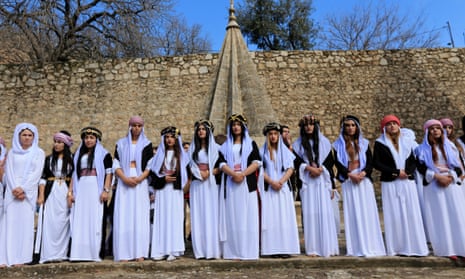 Yazidi women at a ceremony to commemorate the death of women killed by Islamic State in Iraq, March 2019 