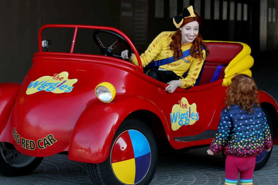 Fan-favourite Emma Watkins smiles at a young fan from the Big Red Car.