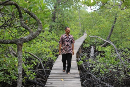 Lamale walking on another jetty.