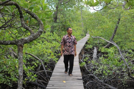 Lamale walking on another jetty. 