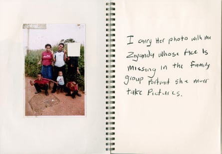 Scrapbook with family pic and one pic cut out