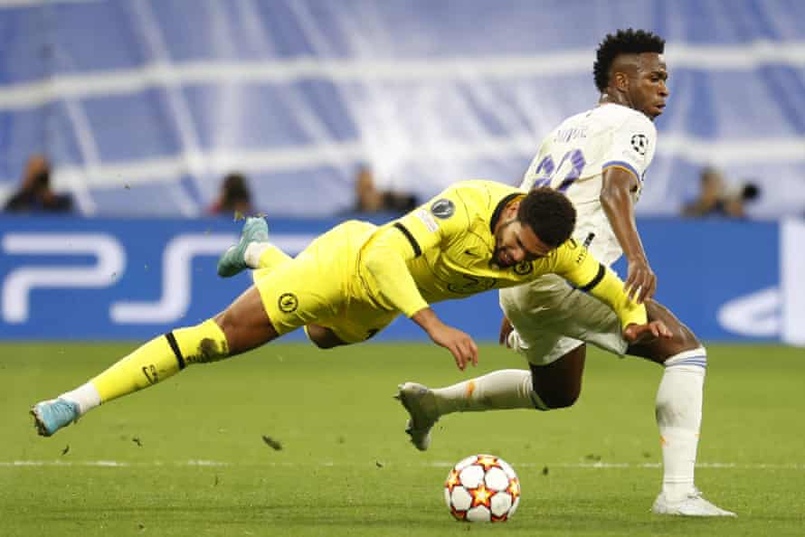Real Madrid's Vinicius Jr. (right) faces Chelsea midfielder Ruben Loftus-Cheek.
