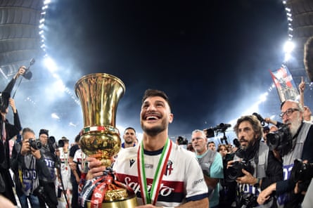 Riccardo Orsolini celebrates with the trophy