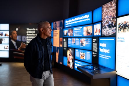 Barack Obama walks through the museum