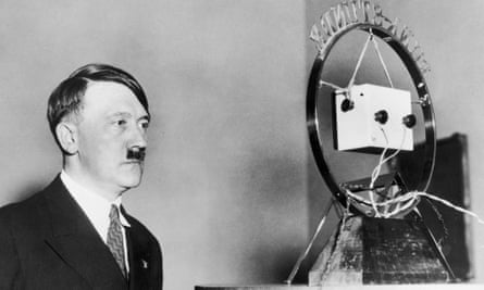 Adolf Hitler makes his first radio broadcast as German chancellor in front of a radio microphone.