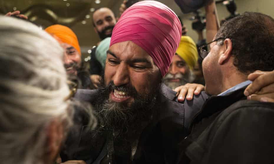 Jagmeet Singh celebrates with supporters after his first-ballot triumph in the contest for leader of the leftist New Democrat party in Toronto on Sunday.