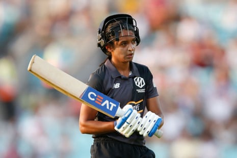 Manchester Originals’ Harmanpreet Kaur looks dejected as she walks off after losing her wicket for 29.