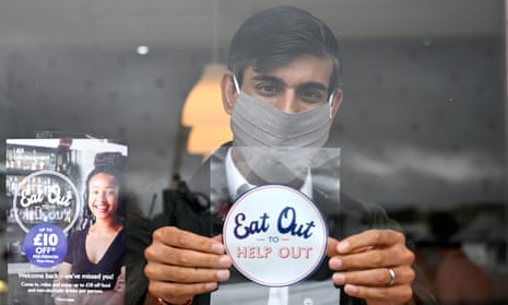 The then chancellor, Rishi Sunak, on 7 August 2020 placing an ‘eat out to help out’ sticker in the window of a business during a visit to the Isle of Bute, Scotland.