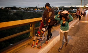 Migrants from Honduras head north through Guatemala in January 2019. The difficulty and danger of the journey to the US is a factor in a rise in Latin American migrants heading for Europe.