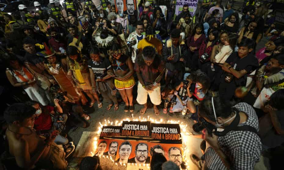 Guarani Indigenous people and human rights activists attend a vigil in Sao Paul for Dom Phillips and Bruno Pereira.