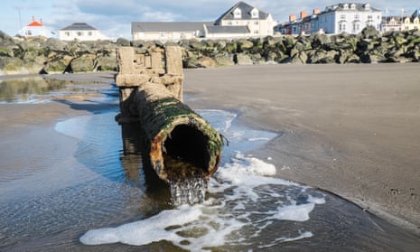 A sewage overflow pipe on Borth beach on the Cardigan Bay coast.
