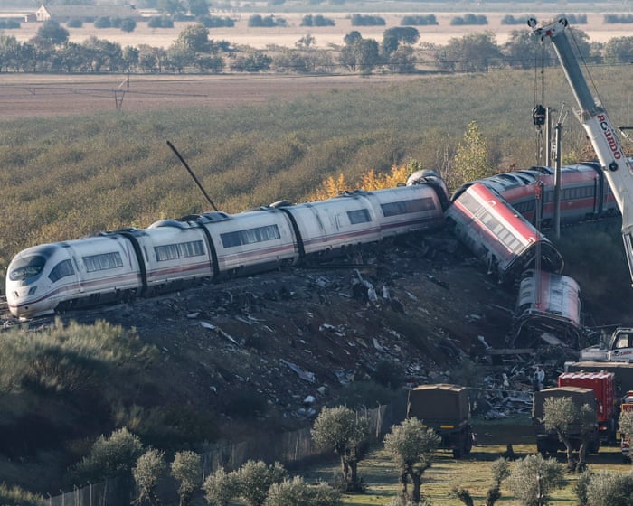 Spain begins mourning period after train crash as search continues for victims in wreckage