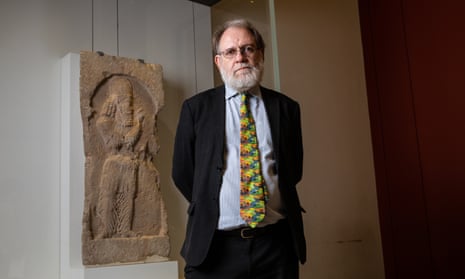 Dr St John Simpson of the British Museum with the looted Sasanian rock relief.