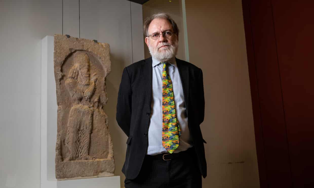 Dr St John Simpson of the British Museum with the looted Sasanian rock relief