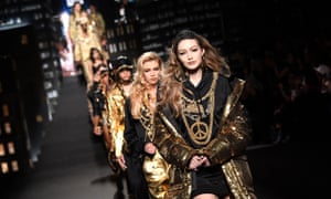 Gigi Hadid walks the catwalk during the Moschino x H&M launch.