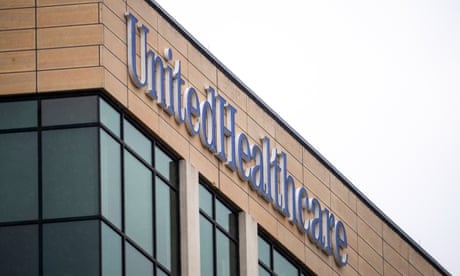 a sign on a building reads 'UnitedHealthcare' a sign on a building reads 'UnitedHealthcare'