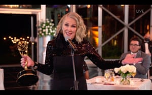 Catherine O’Hara is handed the Emmy for Outstanding Lead Actress in a Comedy Series for Schitt’s Creek