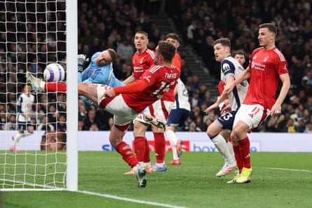 Harry Toffolo of Nottingham Forest clears the ball from the line after a headed effort from Dejan Kulusevski of Tottenham