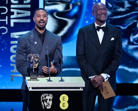 Delroy Lindo and Michael B Jordan on stage presenting a Bafta prize in February.